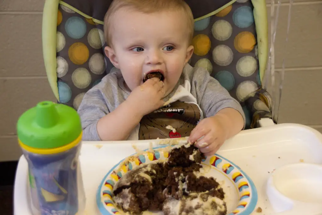 Baby eating smash cake